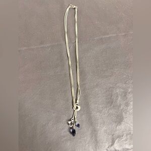 Silver lasso necklace with amethyst jewels